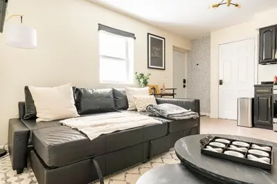 a living room with a couch and a table at 2BR Stay for Crews & Families in Elizabeth