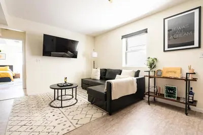 a living room with a couch and a table at 2BR Stay for Crews & Families in Elizabeth