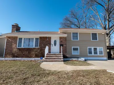 a brick house with a white door at Cozy Apt Lake Park Station Airport Hospital NJ NYC in Rahway