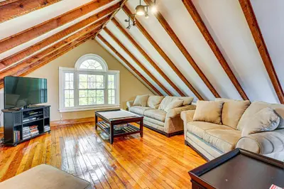 a living room with two couches and a tv at Game Room, Yard and Fire Pit Spacious Catskills Gem in Sparrow Bush