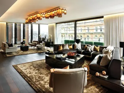 a living room filled with furniture and a large window at Alerona in New York