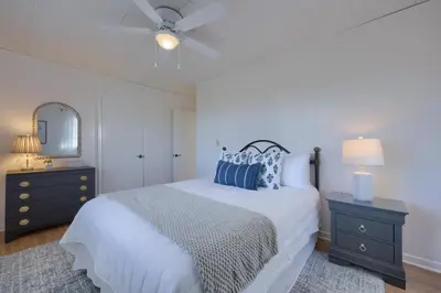 a bedroom with a bed and a ceiling fan at Mountain Sunrise Retreat in Klingerstown
