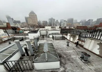 a view of a city from the roof of a building at Midtown West 3 Bedroom Washer dryer and Dishwasher, June to Aug 90 days stay required in New York