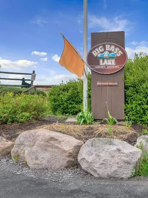 a sign for a no back take sign with rocks at Scandinavian Retreat Hot Tub, Pool, Game Rm in Gouldsboro