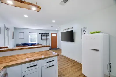 a kitchen with white cabinets and a white refrigerator at Cozy 2 Bedroom apartment in Tannersville, minutes from Camelback Mountain in Tannersville