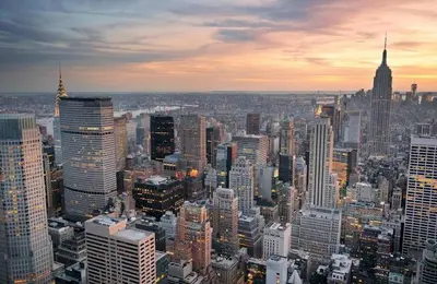 an aerial view of a large city at sunset at Charming 2BR Apartment Near Times Square in New York
