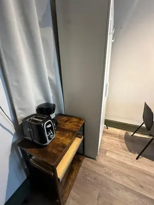 a camera sitting on a table in a room at Cozy 2BR in NYC Lenox Hill in New York