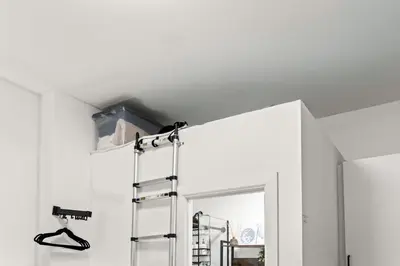 a bathroom with a mirror and a shelf at Micro Studio Walk to Time Square in New York
