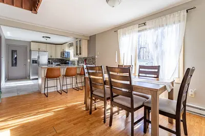 a kitchen and dining room with a table and chairs at Game Room Fire Pit Dog Friendly in Tobyhanna