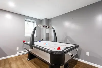 a game room with a trampoline at Lakeside Haven 5 BDR Fire Pit Pet Friendly in Tobyhanna