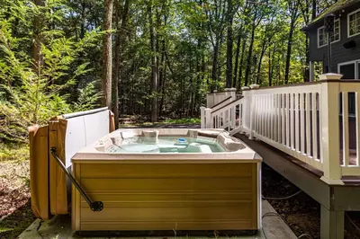 a jacuzziificialificialificialificialificialificialificialificialificialificialificial at Hot Tub Secluded Fire Pit Hammock in Stroudsburg