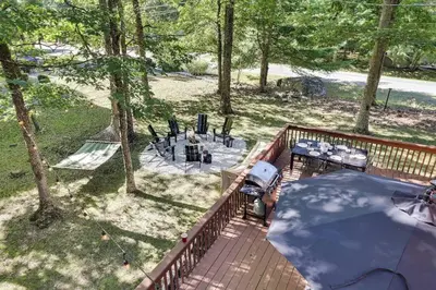 an overhead view of a deck with a table and chairs at Cozy 3 BR Game Area Fire Pit in East Stroudsburg
