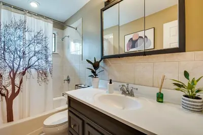 a bathroom with a sink and a toilet and a shower at Serenity Grove Game Room Fire Pit Dog Friend in Pocono Pines