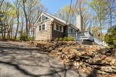 a small house with a stone path in front of it at Cozy 3BD 2Minutes from Beach in East Stroudsburg