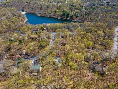 an aerial view of a lake and trees at Cozy 3BD 2Minutes from Beach in East Stroudsburg
