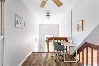 an office with a desk and a chair in a room at Cozy 3Br Fire Pit Hammock 2 Minutes to Beach in East Stroudsburg