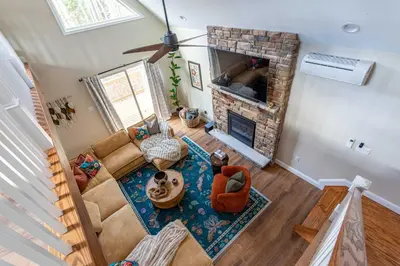 an overhead view of a living room with a fireplace at The Buckhorn Chalet Hot Tub Arcades 6 Bedroom Fire Place in Albrightsville