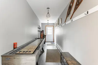 a hallway with a bowling alley in a house at Game Area Open Concept 4 BDR in Albrightsville