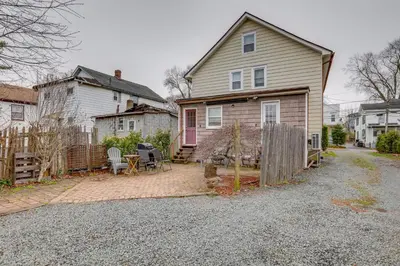 a house with a yard with a fence at Walkable Dtwn Townhome Near Campus and Palmer Square in Princeton