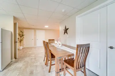 a dining room with a wooden table and chairs at Mtn-View Studio 18 Mi to Penn State! in Spring Mills