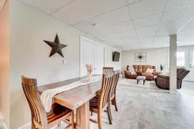 a dining room with a table and chairs and a couch at Mtn-View Studio 18 Mi to Penn State! in Spring Mills