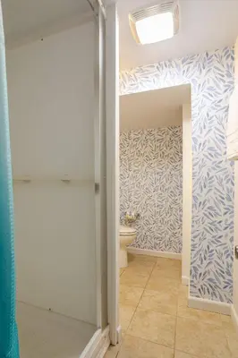 a bathroom with a shower and a toilet at Big City Life: 1BR Apt wNetflix Easy NYC Access in Jersey City