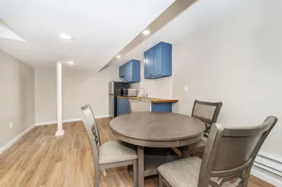 a dining room with a table and chairs at Cozy Basement 2 Bed in Passaic in Passaic
