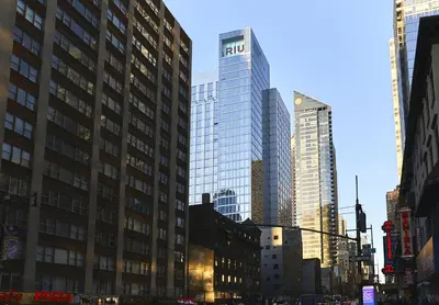 a city street with tall buildings in a city at Riu Plaza New York Times Square in New York