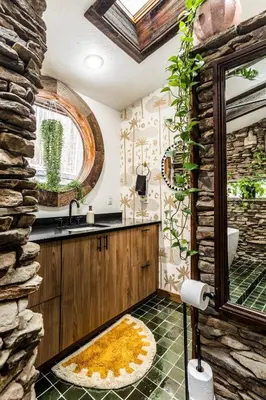 a bathroom with a sink and a bath tub at Stunning Catskills Cabin in Margaretville