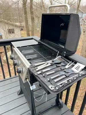 a grill sitting on top of a deck at Newly renovated home, Fire pit, Games, Grill in Tobyhanna