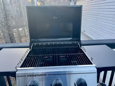 a grill sitting on top of a table at Newly renovated home, Fire pit, Games, Grill in Tobyhanna
