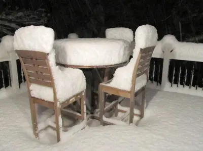 a table and four chairs covered in snow at Stunning Weekend Getaway near Hickory Run State Park in Pennsylvania in Jim Thorpe