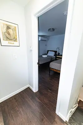 a room with a bedroom with a bed in it at Hudson Haven-Near NYC Transit in West New York