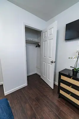 an empty room with a closet and a door at Hudson Haven-Near NYC Transit in West New York