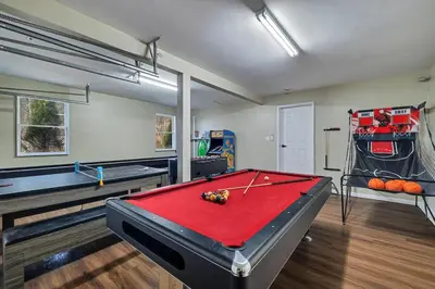 a room with a pool table and a bed at Home in Bushkill Saw Creek Poconos area in Saw Creek