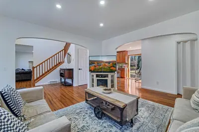 a living room with a couch and a table at Home in Bushkill Saw Creek Poconos area in Saw Creek