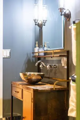 a bathroom with a bowl sink and a mirror at John Quigley House - Downtown New Hope in New Hope