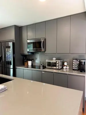 a kitchen with stainless steel appliances and a counter top at Pocono Chalet,Hot Tub,Arcade,Fireplace, Lake,Pool, Pet friendly, near Jim Thorpe No extra fees to use amenities in Towamensing Trails