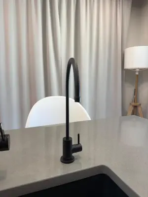 a lamp sitting on top of a counter at Pocono Chalet,Hot Tub,Arcade,Fireplace, Lake,Pool, Pet friendly, near Jim Thorpe No extra fees to use amenities in Towamensing Trails