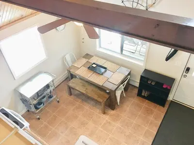 an overhead view of a table and chair in a room at Beautiful Lakefront Chalet in the Poconos! in Hawley
