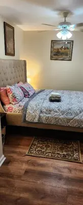 a bedroom with a bed and a ceiling at Amazing family house in Newark
