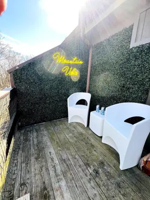 two white toilets sitting on the side of a wall at Home at Camelback Mtn with Game Room near Waterparks in Tannersville