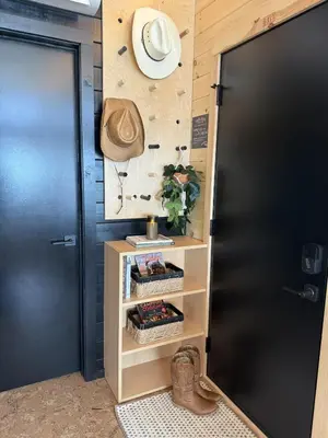 a room with a black door and a shelf at The Retreat on the Ranch (INSANE VIEW) in Gap