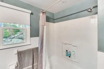 a bathroom with a shower and a tub at Home 2 Mi to Thayer Gate at U S Military Academy in Highland Falls