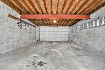 an empty garage with a basketball hoop in it at Downtown Lancaster Luxury 4BR - Garage & Parking in Lancaster