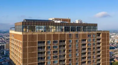 a tall building with a dome on top of it at 1500 Locust Apartments Luxury Living in the Heart of Philadelphia in Philadelphia
