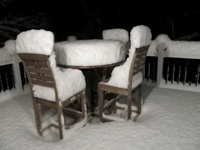 a table and four chairs covered in snow at Rustic Getaway Surrounded by Enchanting Forest near Philadelphia, Pennsylvania in Jim Thorpe
