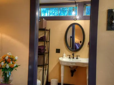 a bathroom with a sink and a mirror at Romantic Cottage Rental Tucked Away in the Countryside near Lancaster, Pennsylvania in Columbia
