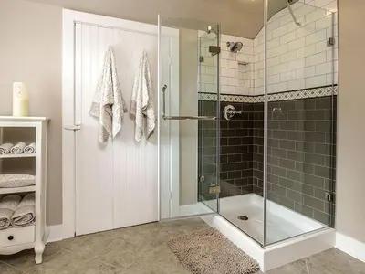 a shower with a glass door in a bathroom at Elegant Farm Cottage Rental for a Countryside Getaway near Lancaster, Pennsylvania in Columbia