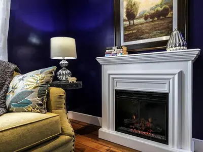 a living room with a fireplace and a couch at Elegant Farm Cottage Rental for a Countryside Getaway near Lancaster, Pennsylvania in Columbia